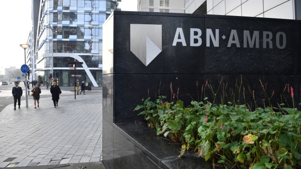The logo for ABN Amro Group NV is displayed on the exterior of the company's headquarters in the Zuidas financial district in Amsterdam, Netherlands, on Tuesday, Jan. 7, 2020. The Dutch economy is estimated to grow 1.4% in 2020 and 1.1% in 2021, Dutch central bank said in a statement. Photographer: Geert Vanden Wijngaert/Bloomberg