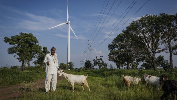 A wind turbine at the ReGen Powertech Pvt. farm in Dewas, Madhya Pradesh, India, on Friday, Sept. 9, 2022. Prime Minister Narendra Modi is pushing a 2070 net-zero goal, and his Power Minister, Raj Kumar Singh, has said the country will limit exports of credits to prioritize its own climate goals. Photographer: Aparna Jayakumar/Bloomberg