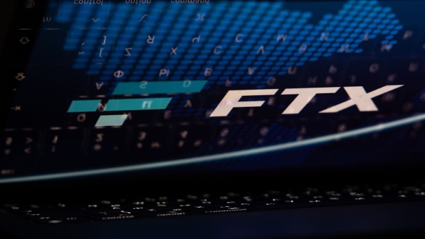 The FTX Cryptocurrency Derivatives Exchange logo on a laptop screen arranged in Riga, Latvia, Nov. 24, 2022. The implosion of Sam Bankman-Fried’s FTX empire dealt a harsh blow to the Bahamas’ ambitions to be a hub for the crypto industry, and it’s causing massive pain for locals who treated the now-bankrupt exchange like a bank.
