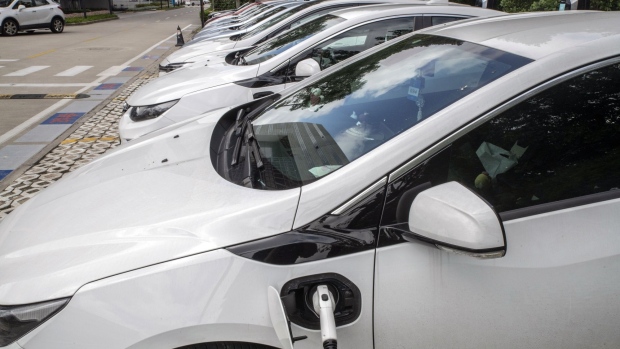 General Motors Co. Buick Velite 5 electric vehicles (EV), part of the fleet for SAIC General Motors Corp.'s internal vehicle sharing service, sits charging in Shanghai, China, on Thursday, July 18, 2019. The future for GM in China is in the hands of customers considering whether to go electric. No other country comes close to China, in terms of scale and adoption of new-energy vehicles, where more electric cars have been sold in Shanghai alone than in all of the U.S., U.K., or Germany.