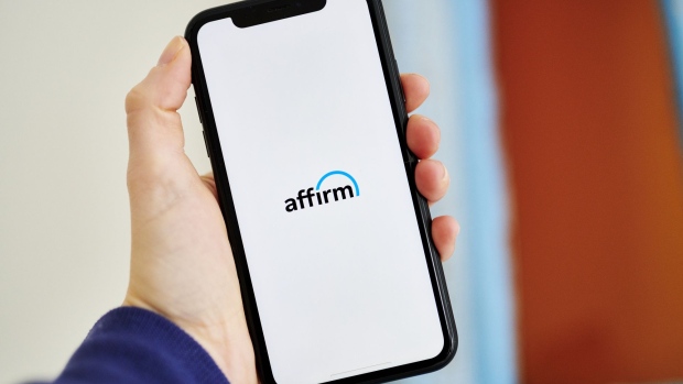 Affirm Holdings Inc. signage on a smartphone arranged in Little Falls, New Jersey, U.S., on Wednesday, Dec. 9, 2020. Affirm Holdings Inc., which lets online shoppers pay for purchases such as Peloton bikes in installments, plans to go public this month. Photographer: Gabby Jones/Bloomberg