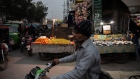 Vendors sell fruit under lights lit by batteries in Lahore, Pakistan, on Monday, Jan. 23, 2023. Millions of people across Pakistans major cities were plunged into a blackout prompted by a power grid failure, dealing another blow to the nation already reeling from surging energy costs. Photographer: Betsy Joles/Bloomberg