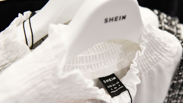The Shein logo on a hanger at the Shein Tokyo showroom in Tokyo, Japan, on Wednesday, Nov. 16, 2022. Fast fashion retailer Shein opened its first permanent store in the world in the Harajuku district of Tokyo on Nov. 13. Photographer: Noriko Hayashi/Bloomberg