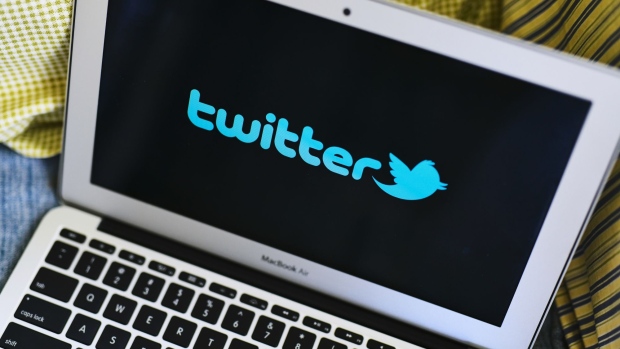 The Twitter Inc. logo is displayed on an Apple Inc. laptop computer in this arranged photograph taken in New Hyde Park, New York, U.S., on Sunday, April 21, 2019. Twitter Inc. is scheduled to release earnings figures on April 23. Photographer: Gabby Jones/Bloomberg
