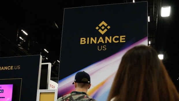 MIAMI, FLORIDA - APRIL 7: The logo of Binance US is seen at its stand in the exhibition hall during the Bitcoin 2022 Conference at Miami Beach Convention Center on April 7, 2022 in Miami, Florida. The worlds largest bitcoin conference runs from April 6-9, expecting over 30,000 people in attendance and over 7 million live stream viewers worldwide.(Photo by Marco Bello/Getty Images) Photographer: Marco Bello/Getty Images North America