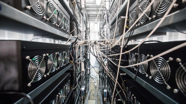 Cables run from a network switch box to graphics processing units (GPU) at the HydroMiner GmbH cryptocurrency mining facility near Waidhofen an der Ybbs, Austria, on Friday, Jan. 19, 2018. HydroMiner, the Austrian cryptocurrency miner that mines bitcoins with green energy, is weighing an initial public offering to fund an expansion outside its home country. Photographer: Akos Stiller/Bloomberg