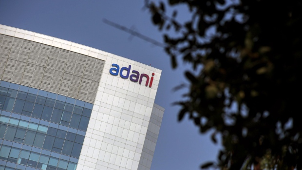 Signage atop the Adani Group headquarters in Ahmedabad, India, on Wednesday, Feb. 1, 2023. The crisis of confidence plaguing Gautam Adani is deepening, with the stock rout triggered by Hindenburg Research's fraud allegations erasing a third of the market value in his group’s companies despite the completion of a key share sale. Photographer: Dhiraj Singh/Bloomberg