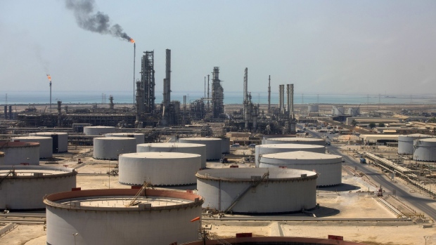 Storage tanks and oil processing facilities operate at Saudi Aramco's Ras Tanura oil refinery and terminal in Ras Tanura, Saudi Arabia, on Monday, Oct. 1, 2018.