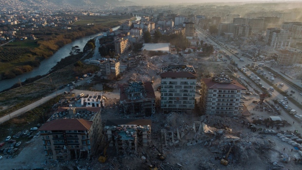 Collapsed and damaged residential buildings in Hatay, Turkey on Feb. 13. Photographer: Nathan Laine/Bloomberg