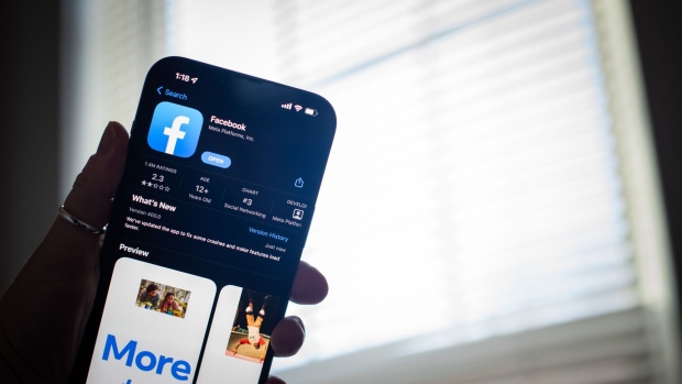The Facebook application on a smartphone arranged in Hastings-on-Hudson, New York, US, on Wednesday, Feb. 1, 2023. Meta Platforms Inc. is scheduled to release earnings figures on February 1. Photographer: Tiffany Hagler-Geard/Bloomberg