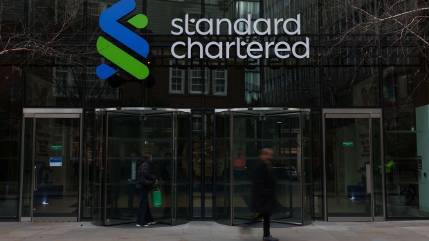 An entrance at the Standard Chartered Plc headquarters in London, UK, on Thursday, Feb. 9, 2023.