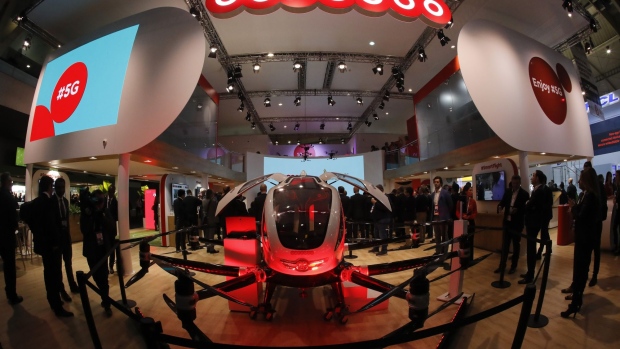 A 5G-enabled self-driving aerial taxi vehicle is displayed on the Ooredoo Q.S.C. stand on the opening day of the MWC Barcelona in Barcelona.