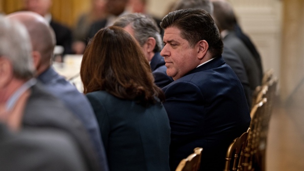 J.B. Pritzker, governor of Illinois, attends the National Governors Association Winter Meeting in the East Room of the White House in Washington, DC, US, on Friday, Feb. 10, 2023. President Biden yesterday denied his administration is considering deporting major numbers of non-Mexican immigrants, saying he didn't think there was a need to do that even if pandemic-era border restrictions are lifted.