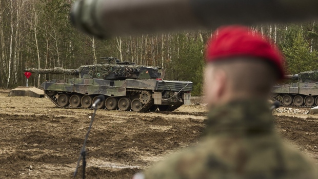 Leopard 2 A4 tanks during an exercise at the Swietoszow Tank Training Center in Poland. Photographer: Bartek Sadowski/Bloomberg