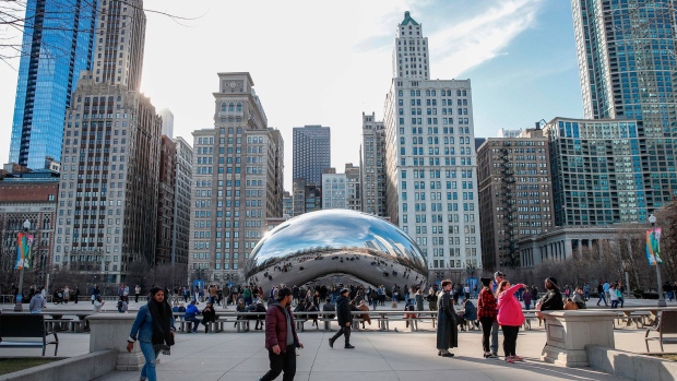 The Cloud Gate statue, known as the “Bean”, in downtown Chicago