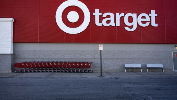 Signage outside a Target store on Black Friday in Chicago, Illinois, US, on Friday, Nov. 25, 2022. US retailers are bracing for a slower-than-normal Black Friday as high inflation and sagging consumer sentiment erode Americans demand for material goods. Photographer: Christopher Dilts/Bloomberg
