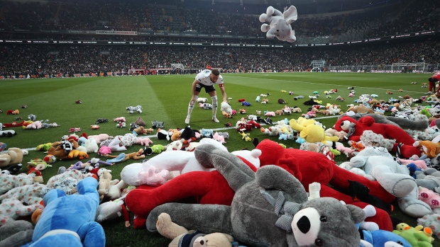 Fans threw toys to be sent to the earthquake victims prior to the Turkish Super Lig soccer match between Besiktas and Fraport TAV Antalyaspor, in Istanbul, Turkey, on Feb. 26, 2023. Photographer: Ali Atmaca/Anadolu/Getty Images