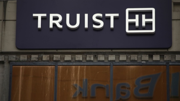 Signage outside a Truist Financial Corp. bank branch in Lexington, Kentucky, U.S., on Sunday, Jan. 16, 2022. Truist Financial reported adjusted earnings per share for the fourth quarter that beat the average analyst estimate.