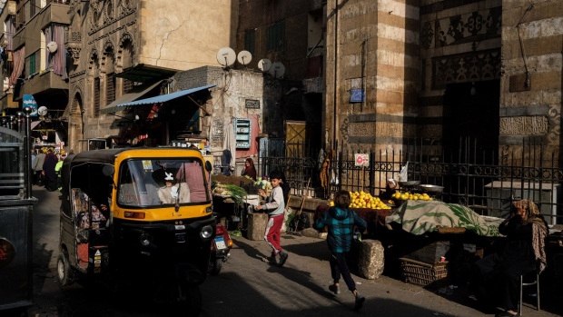 A tuk-tuk vehicle travels along a street in the Al-Khalifa district of Cairo, Egypt, on Saturday, Jan. 7, 2023. Egypt’s urban inflation accelerated at its fastest pace in five years as several rounds of currency devaluation filtered through to consumers. Photographer: Islam Safwat/Bloomberg