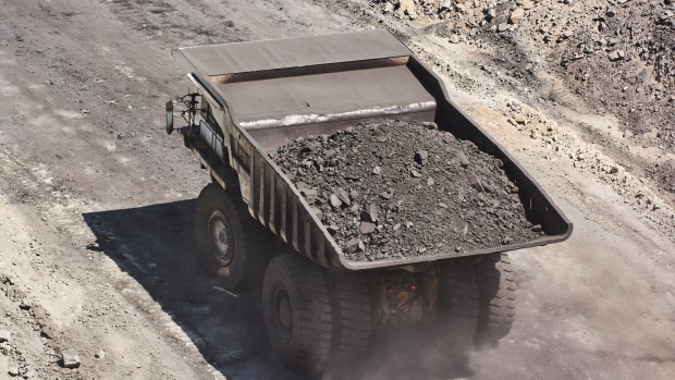 A dump truck transports excavated rock along an access road at the Mafube open-cast coal mine, operated by Exxaro Resources Ltd. and Thungela Resources Ltd., in Mpumalanga, South Africa on Friday, Sept. 9, 2022. South Africa relies on coal to generate more than 80% of its electricity, and has been subjected to intermittent outages since 2008 because state utility Eskom Holdings SOC Ltd. can't meet demand from its old and poorly maintained plants. Photographer: Waldo Swiegers/Bloomberg