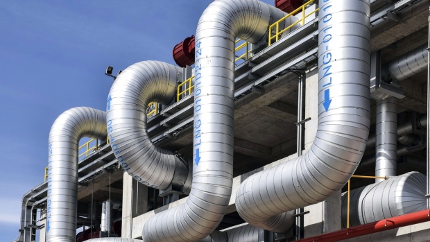Pipework stands at ENN Energy Holdings Ltd.'s liquefied natural gas(LNG) terminal on Zhoushan Island, Zhejiang province, China, on Thursday, Nov. 1, 2018. Gas is in such hot demand in China right now its allowing a quirky market to flourish: transporting the fuel on trucks. The countrys top suppliers are loading liquefied natural gas onto tanker trucks and delivering it to users to make up for insufficient pipeline coverage inland. Photographer: Bloomberg/Bloomberg