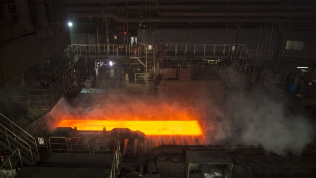 A hot steel slab moves along a conveyor of a plate mill at the Nippon Steel & Sumitomo Metal Corp. plant in Kashima, Ibaraki, Japan, on Wednesday, April 18, 2018. President Donald Trump and Japanese Prime Minister Shinzo Abe committed Wednesday to intensify bilateral trade talks. Trump is pushing for an agreement that would reduce the U.S. trade deficit with Japan, while Abe is seeking an exemption from the steel and aluminum tariffs that Trump announced last month.