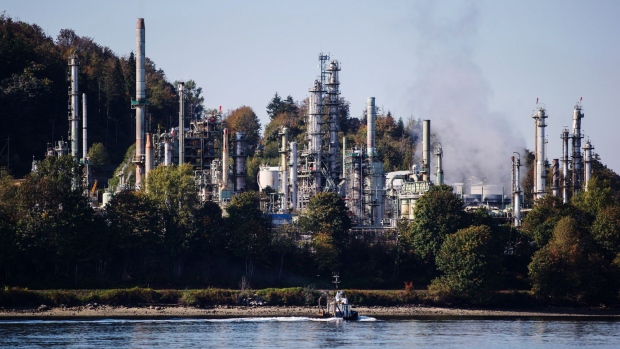 A boat sails past the Burnaby Refinery, operated by Parkland Fuel Corp., in Burnaby, British Columbia, Canada, on Wednesday, Sept. 19, 2018. U.S. Trade Representative Robert Lighthizer and Canadian Foreign Minister Chrystia Freeland met Thursday in Washington to negotiate Nafta talks, but no agreement was reached.