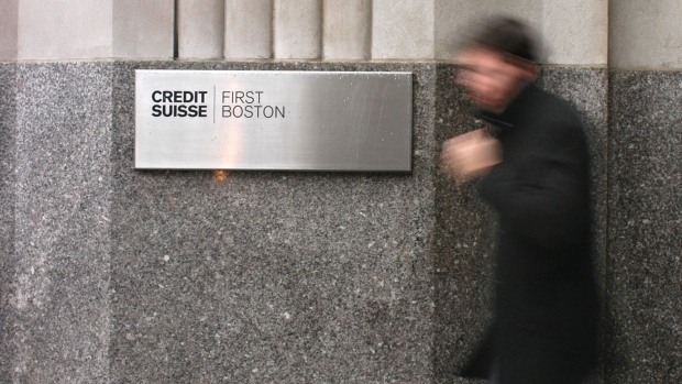 A pedestrian walks past Credit Suisse First Boston offices Tuesday, December, 7, 2004, in New York. Credit Suisse Group's decision to fold its Credit Suisse First Boston securities unit into the rest of the bank may add to a list of names that have vanished from Wall Street. Photographer: JOHN POWELL/BLOOMBERG NEWS
