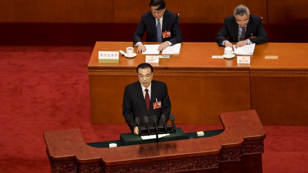Li Keqiang delivers a speech in Beijing on March 5. Photographer: Lintao Zhang/Getty Images 