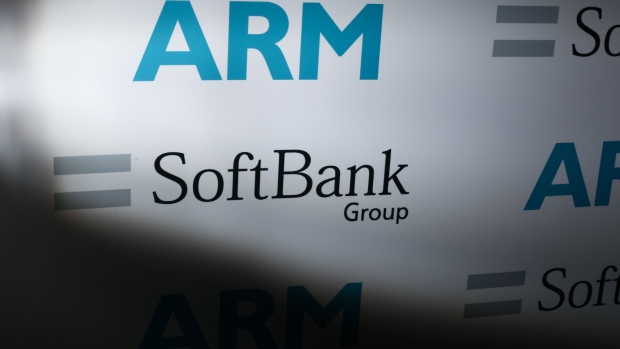Logos of ARM Holdings Plc and SoftBank Group Corp sit on a background during a news conference in London, U.K., on Monday, July 18, 2016. SoftBank Group Corp. agreed to buy ARM Holdings Plc for 24.3 billion pounds ($32 billion), securing a slice of virtually every mobile computing gadget on the planet and future connected devices in the home. Photographer: Chris Ratcliffe/Bloomberg