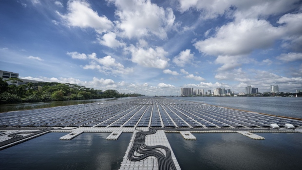 The floating solar photovoltaic power plant by EDPR Sunseap Group, a unit of Energias de Portugal SA, in Woodlands, in Singapore, on Wednesday, Dec. 7, 2022. EDPR Sunseap has built a floating solar farm in the sea off Singapore that supplies power to its customer Meta Platforms Inc. via the national grid. Senior officials say the facility is part of the company's plan to expand in Singapore and Vietnam. Photographer: Bryan van der Beek/Bloomberg