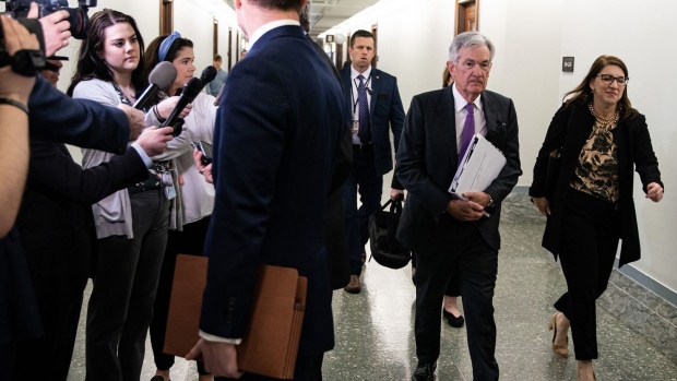 Jerome Powell, center right, arrives before a Senate Banking, Housing, and Urban Affairs Committee hearing in Washington, DC, on March 7, 2023. Photographer: Al Drago/Bloomberg