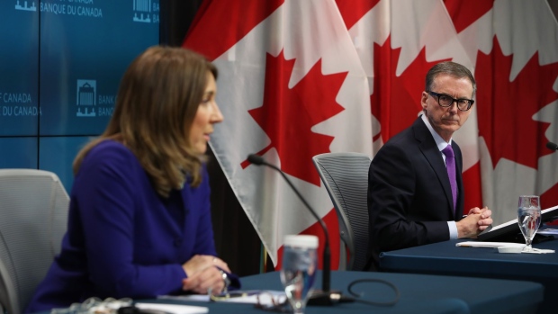 Carolyn Rogers speak alogside Tiff Macklem at a news conference in Ottawa on Jan. 25.