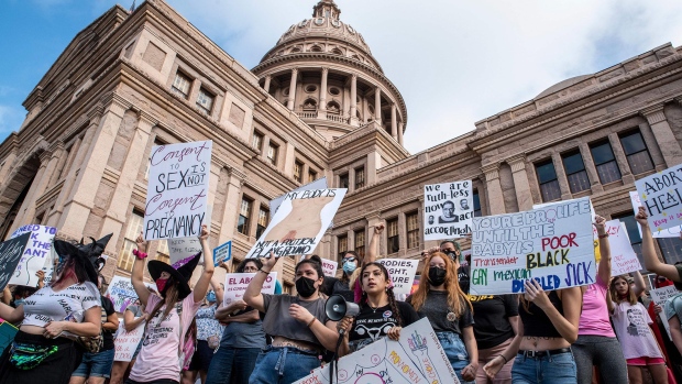 Protesters take part in the Women's March and Rally for Abortion Justice at the State Capitol in Austin, Texas. Photographer: SERGIO FLORES/AFP