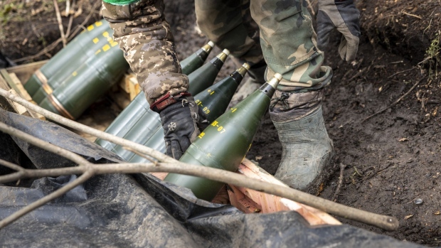 Ukrainian servicemen prepare artillery shells in Donetsk, Ukraine.