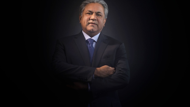 Arif Naqvi, chief executive officer of Abraaj Capital Ltd., poses for a photograph following a Bloomberg Television interview at the World Economic Forum (WEF) in Davos, Switzerland, on Tuesday, Jan. 17, 2017. World leaders, influential executives, bankers and policy makers attend the 47th annual meeting of the World Economic Forum in Davos from Jan. 17 - 20.