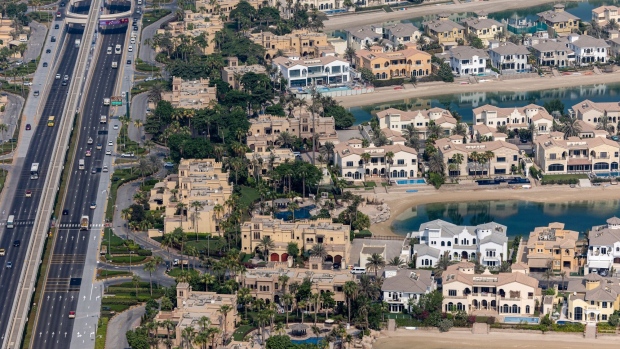 Residential villas on the waterside of the Palm Jumeirah in Dubai, United Arab Emirates, on Wednesday, Sept. 28, 2022. The emirate’s prime real-estate prices surged 70.3% over the 12 months through September, making it the biggest gainer on Knight Frank’s global index, which focuses on a city’s most desirable and expensive homes.
