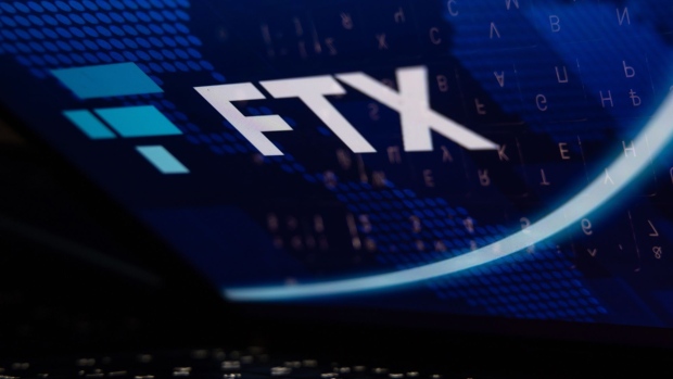 The FTX Cryptocurrency Derivatives Exchange logo on a laptop screen arranged in Riga, Latvia, Nov. 24, 2022. The implosion of Sam Bankman-Fried’s FTX empire dealt a harsh blow to the Bahamas’ ambitions to be a hub for the crypto industry, and it’s causing massive pain for locals who treated the now-bankrupt exchange like a bank.
