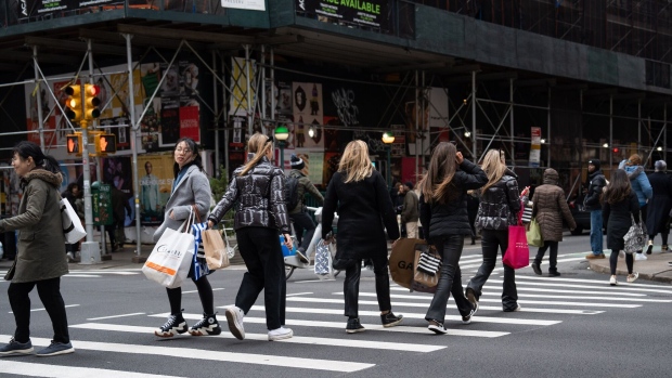 Shoppers in the SoHo neighborhood of New York, US, on Saturday, Jan. 21, 2023. The Bureau of Economic Analysis is scheduled to release personal spending figures on January 27.
