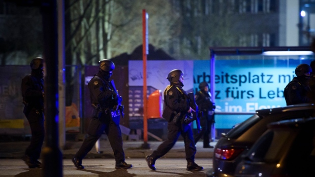 HAMBURG, GERMANY - MARCH 09: Police officers gather at the scene of a shooting that has left at least six people dead and four wounded in Alsterdorf district, on March 9, 2023 in Hamburg, Germany. (Photo by Gregor Fischer/Getty Images) Photographer: Gregor Fischer/Getty Images Europe