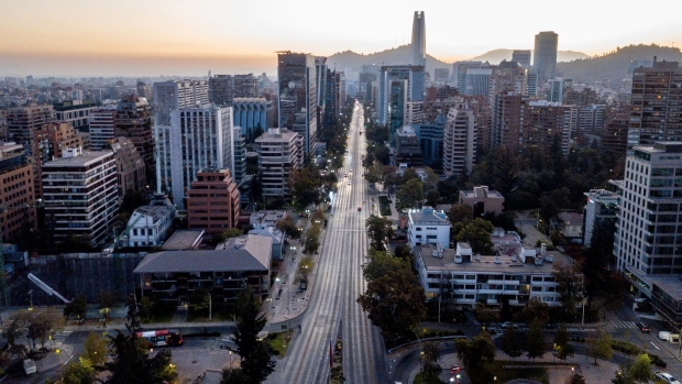 Empty streets and the Santiago skyline in Chile. Photographer: Cristobal Olivares/Bloomberg