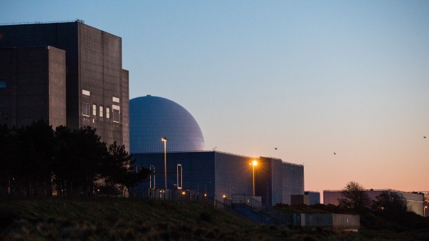 Sizewell A, left, and B, right, nuclear power stations, operated by Electricite de France SA (EDF), stand in Sizewell, U.K., on Friday, May 15, 2020. The network operator struck a deal with EDF to cut supply at its Sizewell nuclear plant by half for at least six weeks because the demand for power is 20% lower than normal as measures to contain the coronavirus have shut industry and kept people at home for weeks.