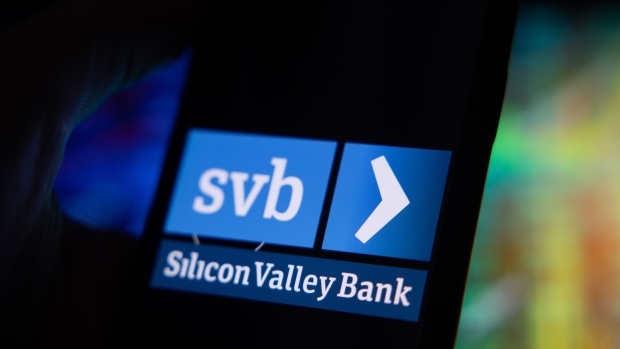 The Silicon Valley Bank logo on a smartphone screen arranged in Riga, Latvia, on Friday, March 10, 2023. Panic spread across the startup world as worries about the financial health of Silicon Valley Bank, a major lender to fledgling companies, prompted Peter Thiel’s Founders Fund and other prominent venture capitalists to advise portfolio businesses to withdraw their money, even as the bank’s top executive urged calm. Photographer: Andrey Rudakov/Bloomberg