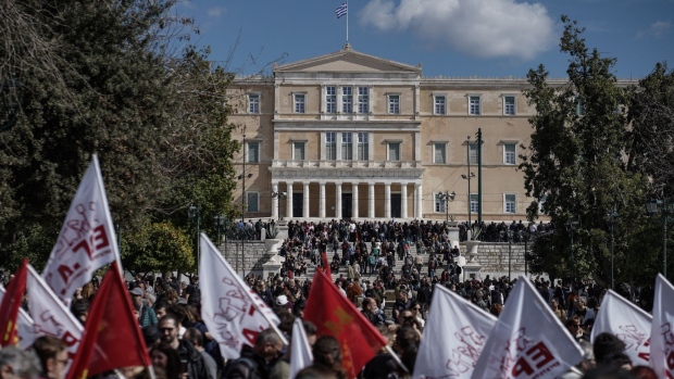 Protesters gather near the parliament building in Syntagma square in Athens, Greece, on March 8.