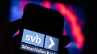 The Silicon Valley Bank logo on a smartphone arranged in Riga, Latvia, on Friday, March 10, 2023. Panic spread across the startup world as worries about the financial health of Silicon Valley Bank, a major lender to fledgling companies, prompted Peter Thiel’s Founders Fund and other prominent venture capitalists to advise portfolio businesses to withdraw their money, even as the bank’s top executive urged calm. Photographer: Andrey Rudakov/Bloomberg