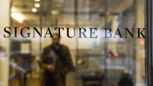 Signage outside a Signature Bank branch in New York, US, on Monday, March 13, 2023. The sudden closure of New York's Signature Bank by state regulators Sunday underscored the urgency of extraordinary US efforts to backstop the nations banking system and quell mounting concerns among customers about the safety of their deposits.