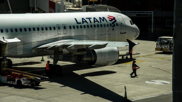 A Latam Airlines aircraft on the tarmac of Arturo Merino Benitez International Airport (SCL) in Santiago.