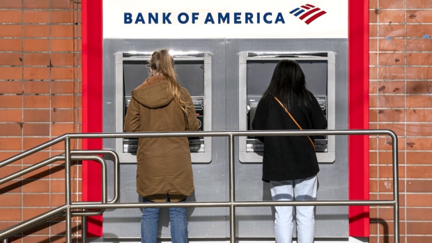 People use an automated teller machine (ATM) at a Bank of America bank branch in San Francisco, California, U.S., on Monday, April 12, 2021. Bank of America Corp. is scheduled to release earnings figures on April 15. Photographer: Bloomberg/Bloomberg