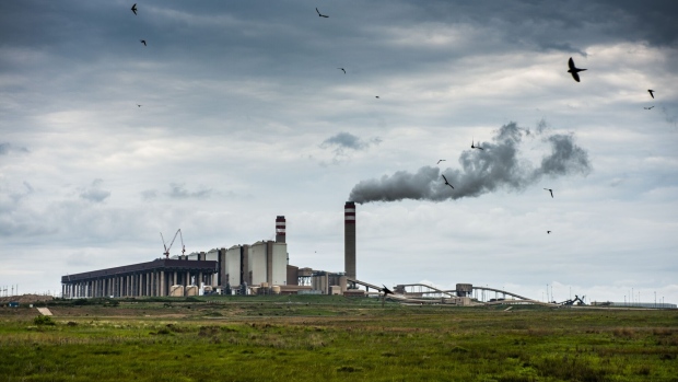 Emissions rise from a tower of the Eskom Holdings SOC Ltd. Kusile coal-fired power station in Mpumalanga, South Africa, on Monday, Dec. 23, 2019. The level of sulfur dioxide emissions in the Kriel area in Mpumalanga province only lags the Norilsk Nickel metal complex in the Russian town of Norilsk, the environmental group Greenpeace said in a statement, citing 2018 data from NASA satellites.