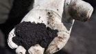 Alberta worker holds oilsands